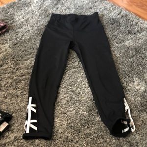 Black Capri leggings with white cut out